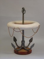 Unsual coffe table made with an anchor and a lifebuoy Click photo for more details