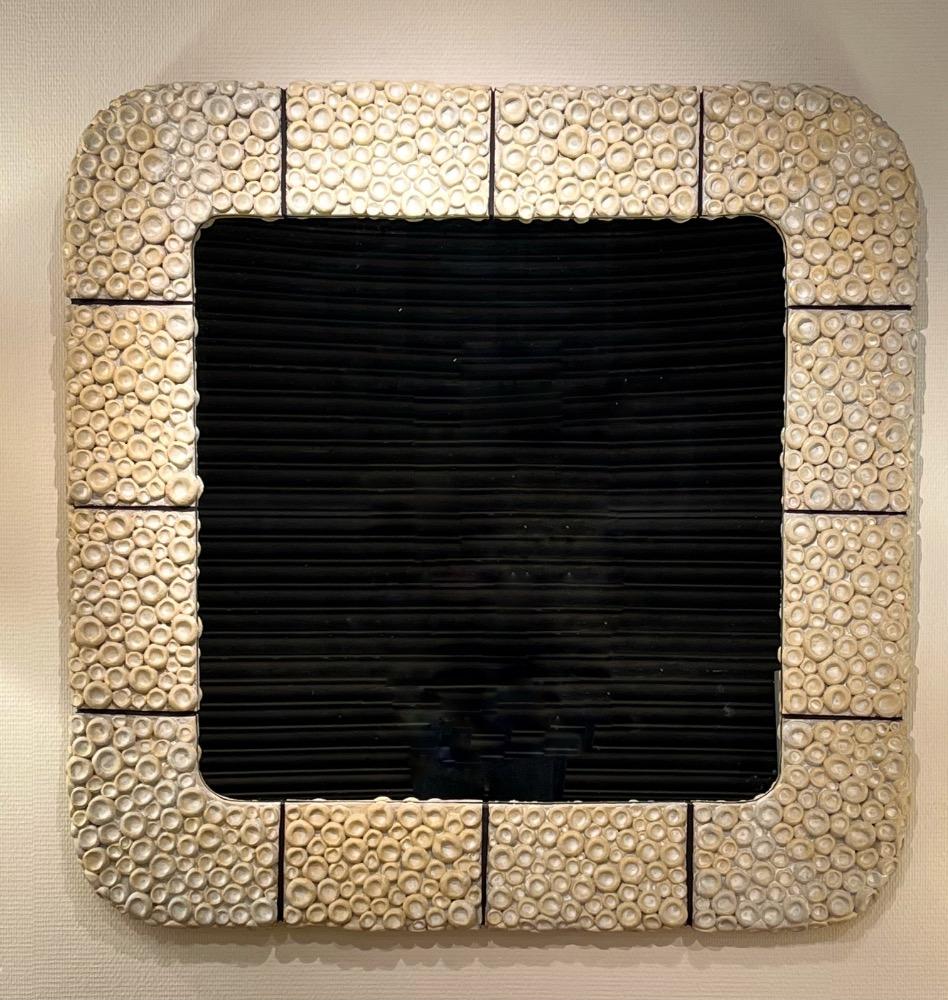 Ceramic mirror by A. Belen-Castillo, France. 2023.