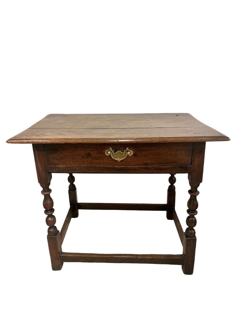 Oak accent table. France early 18th century.