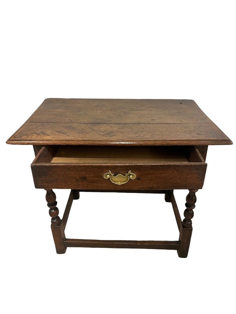 Oak accent table. France early 18th century.