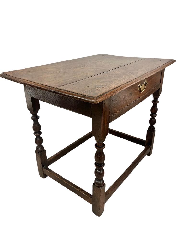 Oak accent table. France early 18th century.