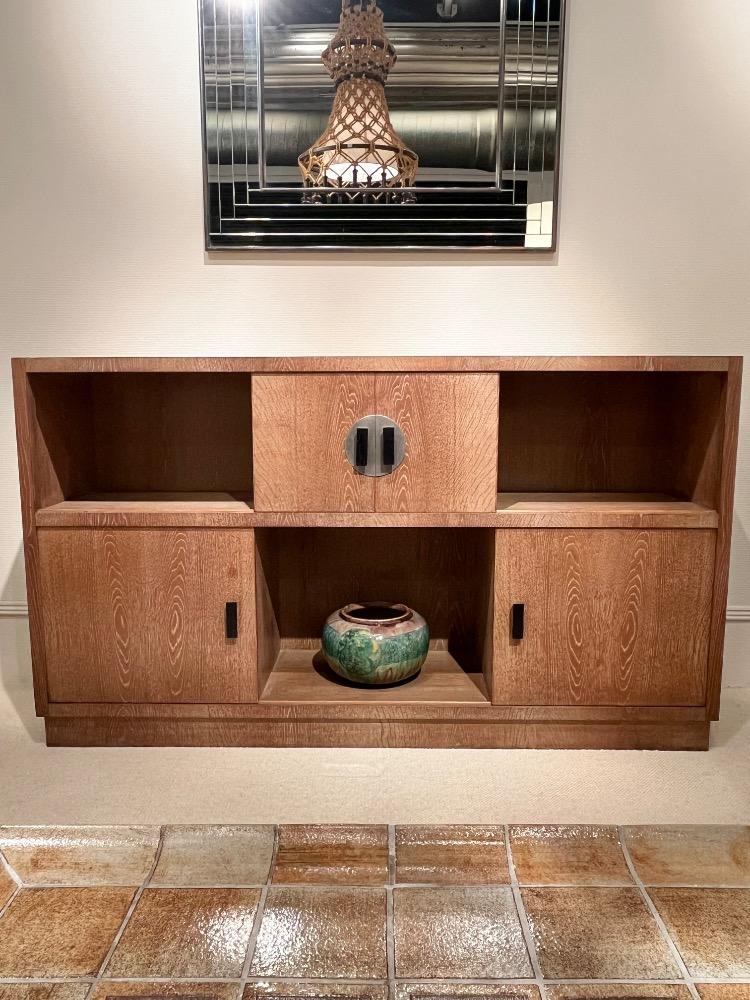 Oak cerused credenza, sliding doors. France circa 1930-40.