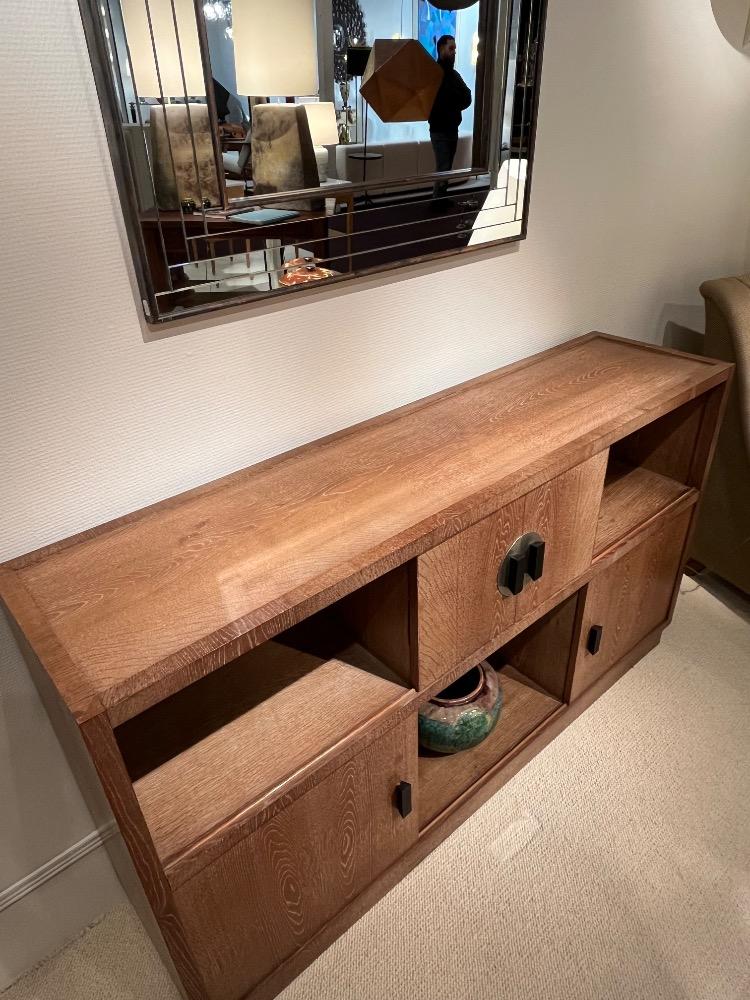 Oak cerused credenza, sliding doors. France circa 1930-40.