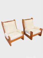 Pair of elmwood lounge chairs. Maison Regain, France circa 1970.