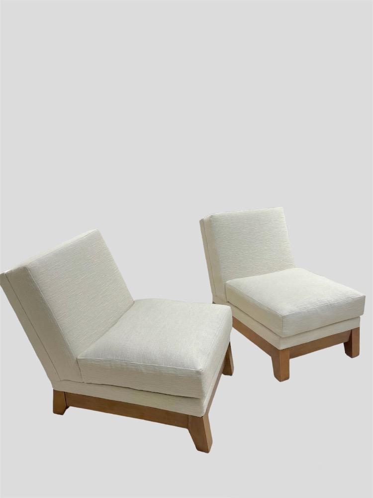 Pair of sycamore slipper chairs. France circa 1940-50.