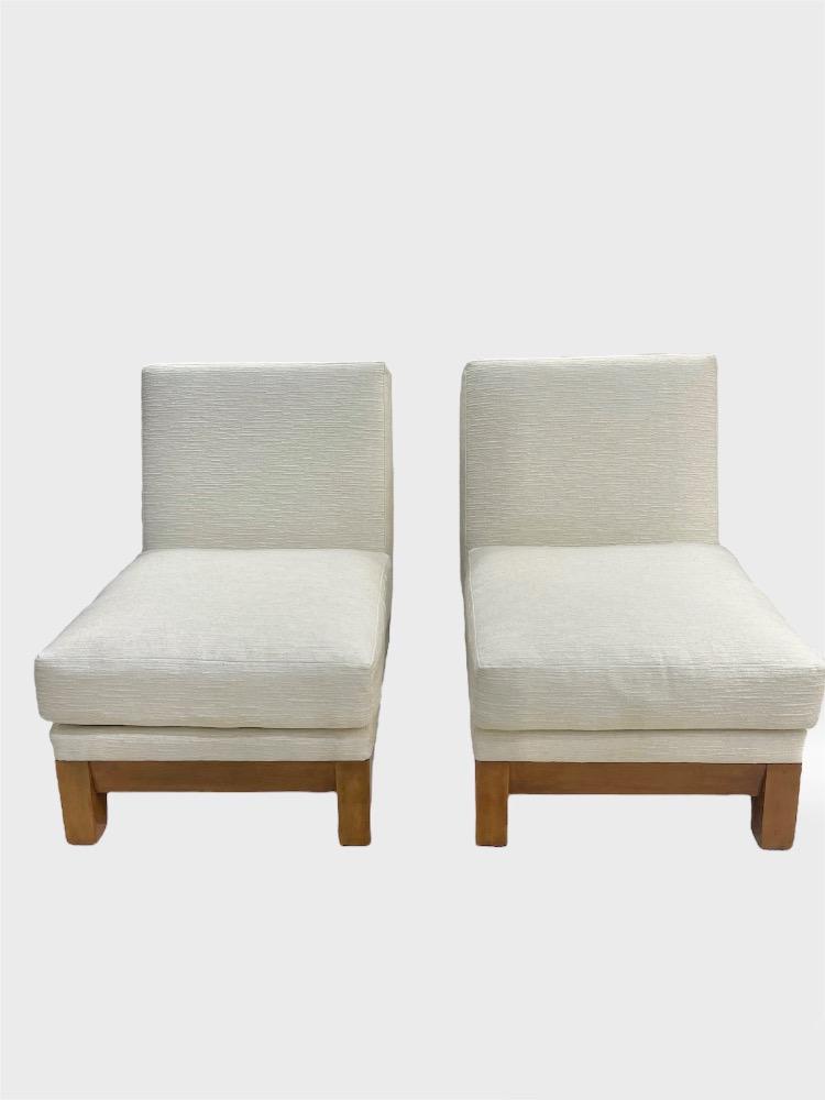 Pair of sycamore slipper chairs. France circa 1940-50.