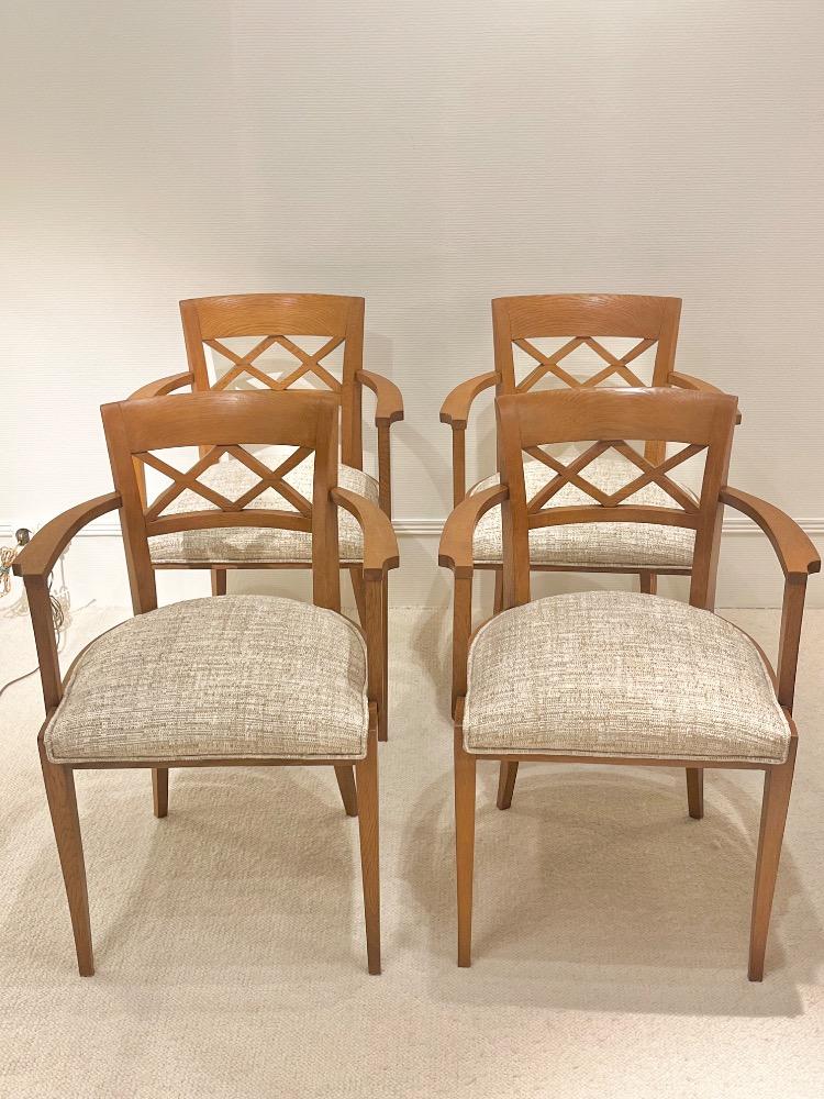Set of four oak  armchairs. France circa 1940.