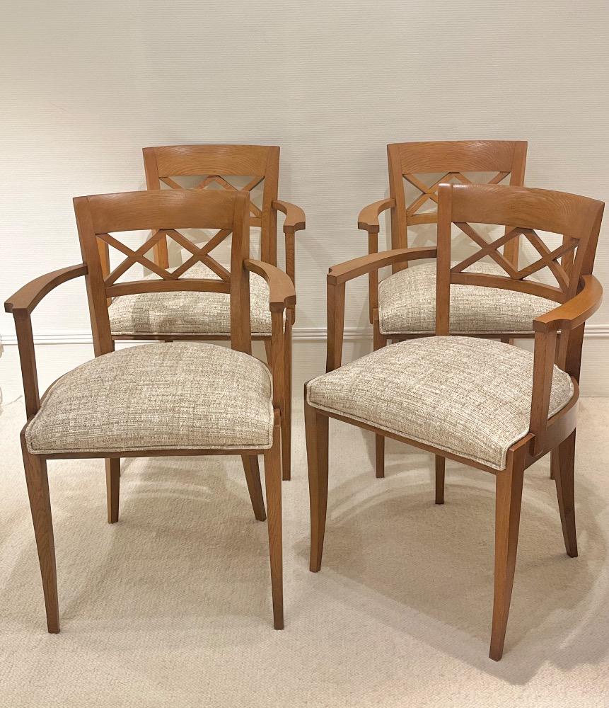 Set of four oak  armchairs. France circa 1940.