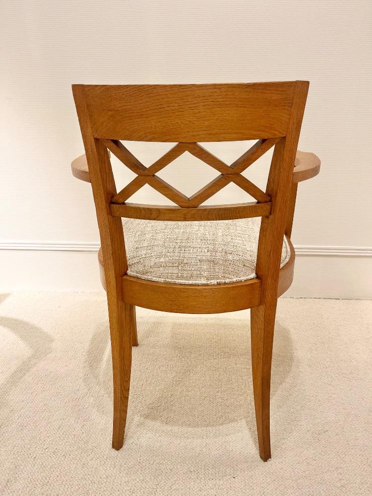 Set of four oak  armchairs. France circa 1940.