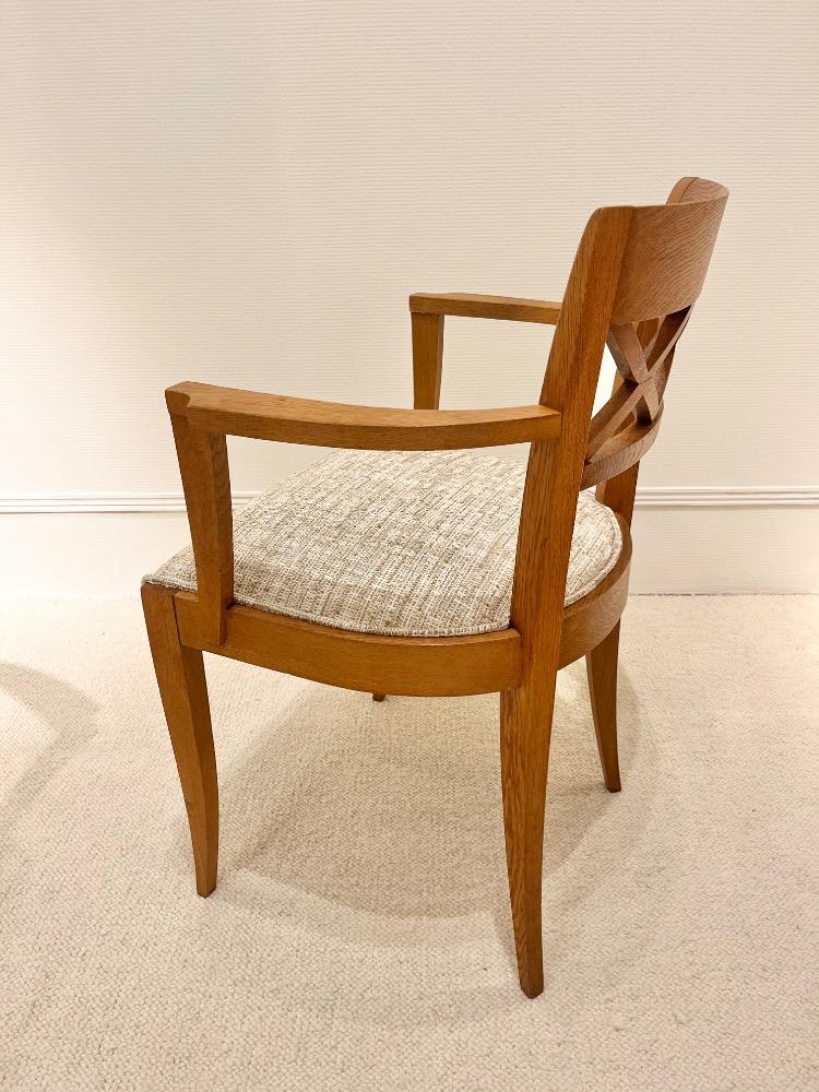 Set of four oak  armchairs. France circa 1940.