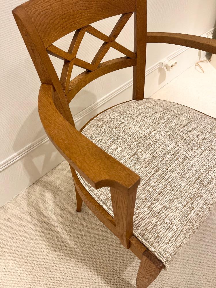 Set of four oak  armchairs. France circa 1940.